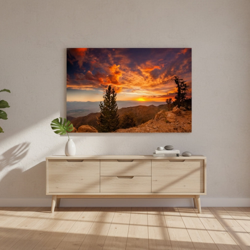 A Solitary Moment Where The Rugged Earth Meets The Explosive Grandeur Of The Dying Daylight Sky