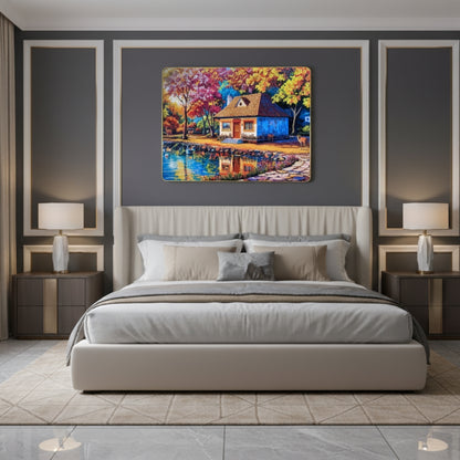 A Charming Little Cottage Nestled Among Vibrant Colorful Trees At The Edge Of A Peaceful Blue Lake